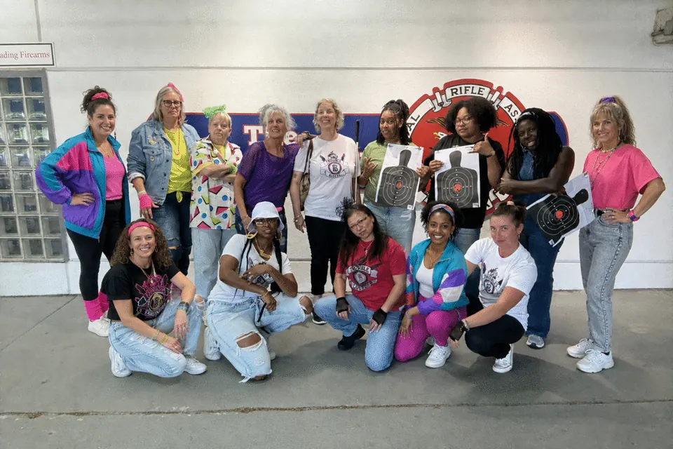 Trouble Defense women’s training group gathered at the NRA Range