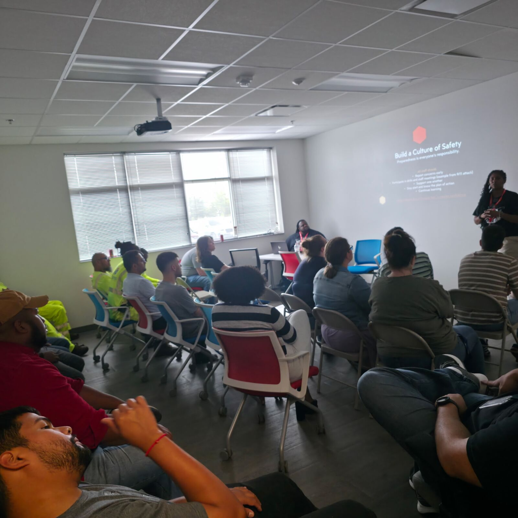 Trouble Defense instructor delivering employee safety presentation to I-66 Express Mobility Partners