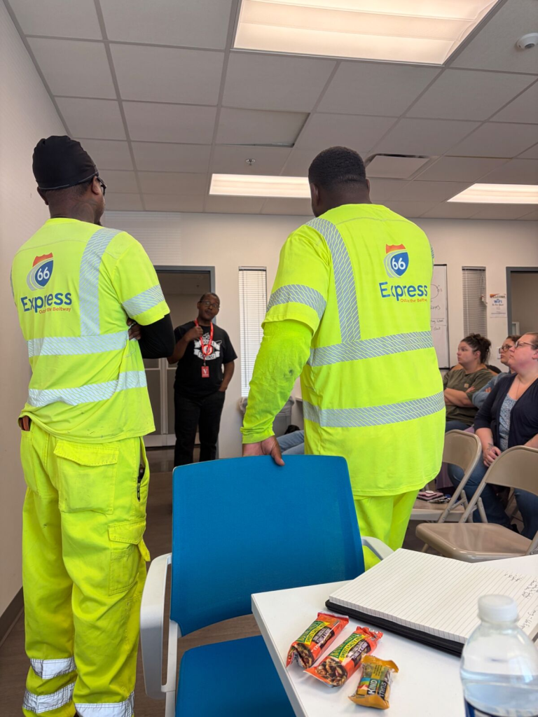 Employees and instructor taking part in a Trouble Defense workplace emergency preparedness discussion